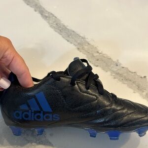 Boys adidas black and blue soccer cleats
